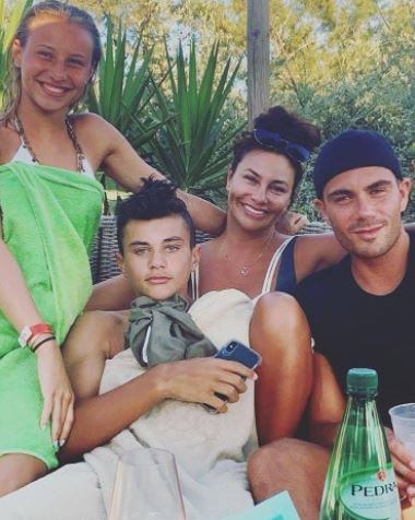 Stacey Cooke with her boyfriend Max George and children.